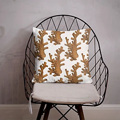 A Mockup of a Patterned Pillow on a Chair