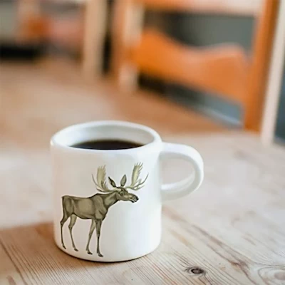 A Mug with a Moose Design